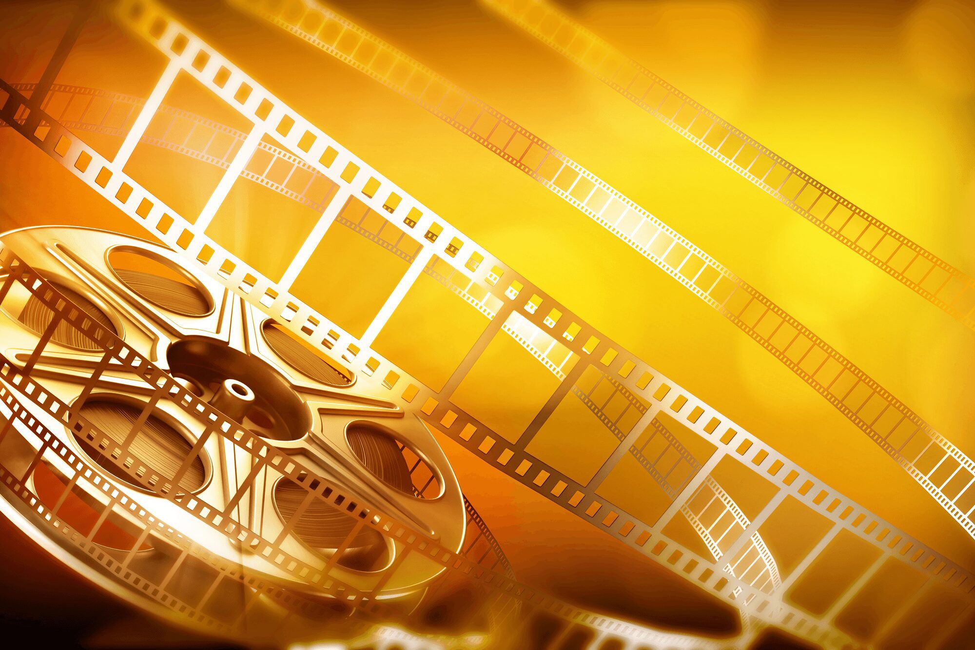 A film reel with several strips of film unwinding against a bright, golden background.